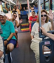 Passengers on Pulse respond to a boarding passenger’s greeting. GRTC reported that 6,240 people rode the Pulse on June 24, the first day of service. On Monday, Pulse carried 8,669 passengers.
