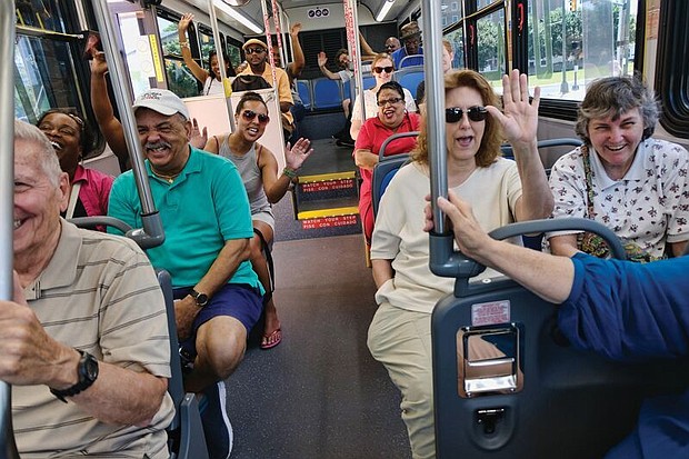 Passengers on Pulse respond to a boarding passenger’s greeting. GRTC reported that 6,240 people rode the Pulse on June 24, the first day of service. On Monday, Pulse carried 8,669 passengers.
