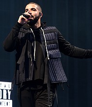 The rapper dropped "Scorpion" Thursday, which features 25 tracks and includes a guest appearance by Jay-Z and a previously unreleased vocal by Jackson, who died in 2009.
