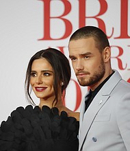 	Liam Payne and former "X Factor U.K." judge Cheryl are going in separate directions.