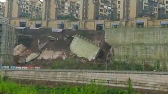 A road in China's Sichuan Province collapsed on Sunday after days of heavy rain. In a video that captured the …