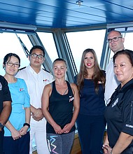 	Crew members on Carnival Glory who played a role in the rescue at sea on Sunday of a Norwegian Cruise Line crew member.  From left to right: Securitay Guard Ramon Morales; Assistant Stateroom Steward Ni Puti Kharisma Dew Wiryanari; Assitance Chief Security Rishu Thapa; Playlist Dancer Karleigh Wright; Assistant Shore Excursion Manager Maja Krstic; Captain Pero GrubjeÅ¡ic; Safety Officer Cesare Mattera and Security Guard Irma Caldino Mariscotes.