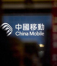 China Mobile wanted to provide cell phone and other communication services between the United States and other countries. It submitted an application for a license to US regulators back in 2011.   CREDIT: Brent Lewin/Bloomberg via Getty Images