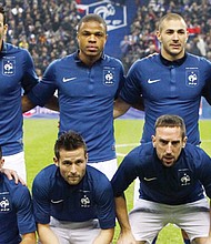 Diverse French team advances to quarterfinals of World Cup in Russia.