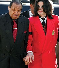 Joseph “Joe” Jackson, patriarch of the famous musical family that bears his name, died on Wednesday, June 27, at age 89. He’s shown here in 2005 with his superstar son, Michael, who died in June 2009.