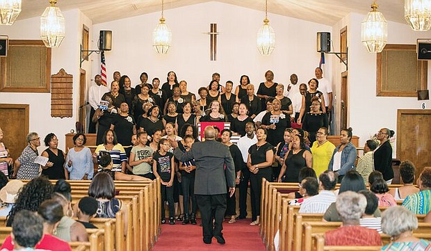 CELEBRATING 150 YEARS
The full choir of St. John Baptist Church lifts its voice to mark the North Side church’s 150th anniversary. The June 16 event in the sanctuary at 4317 North Ave. featured a reunion of past and present members of the music ministry, according to Dr. Janet K. Copeland, the church’s minister of music.