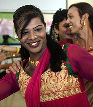 An Indian transgender resident dances with others at an event to celebrate a Supreme Court judgement in 2014. India's highest court ruled that a person can be legally recognized as gender-neutral.