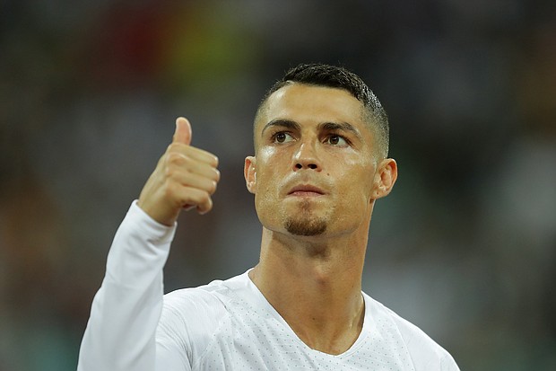 Cristiano Ronaldo arrives to crowd fanfare at Juventus/CREDIT: Richard Heathcote/Getty Images Europe/Getty Images

Cristiano Ronaldo is seen here during the 2018 FIFA World Cup match between Uruguay and Portugal at Fisht Stadium on June 30, 2018 in Sochi, Russia.