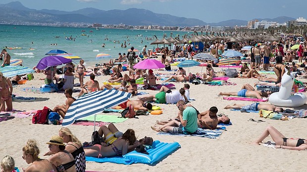 Authorities in the island's capital, Palma, are mounting a war on what they call "the tourism of excesses," cracking down on public nudity, drinking, sex acts and anti-social behavior./Getty Image