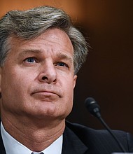 	FBI Director Christopher Wray said Wednesday that Russia was engaging in real-time "malign influence operations" against the United States and called the country the "most aggressive actor" in the space of election interference.