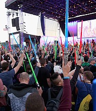 For those seeking to understand Disney's strategy under CEO Robert Iger, just take a look around the colorful halls of Comic-Con: Thousands of people who spent hard-earned cash trekking to San Diego -- in some cases great distances -- to savor their favorite pastimes, many dressed in purchased or home-made costumes.  CREDIT: Jesse Grant/Getty Images for Disney