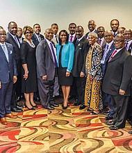 AME Church bishops pose with black bankers and business leaders after the June 26 announcement of the historic partnership.