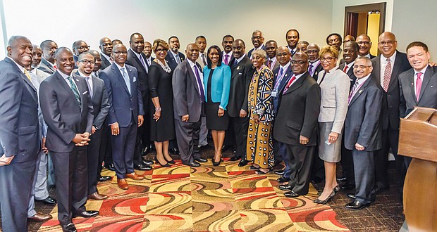 AME Church bishops pose with black bankers and business leaders after the June 26 announcement of the historic partnership.