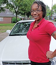 Kiocia Wilkerson of South Side is happy and proud about the 2002 Kia Optima that was presented to her by David L. Williams Jr. and the DLW Veterans Outreach and Training Center during the spring.  