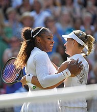 Serena Williams, left, congratulates Angelique Kerber of Germany on her win in the women’s singles final Saturday at Wimbledon.