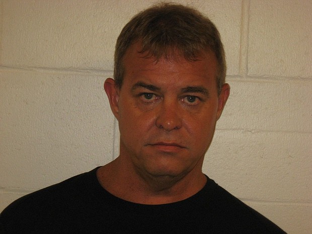 John K. O'Connor - A man is in custody after allegedly fatally shooting a man and wounding another person at a Mormon church in Nevada, police say.