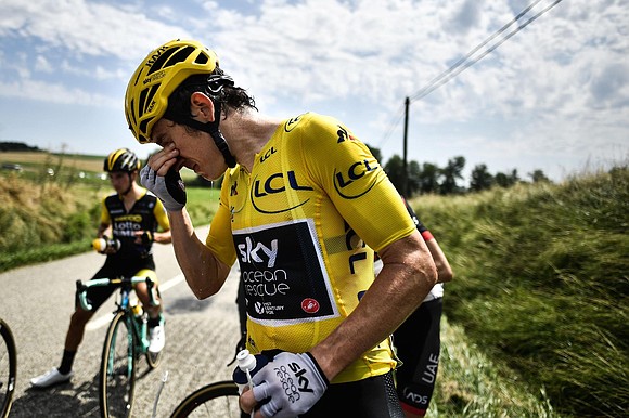 The Tour de France -- cycling's most prestigious race -- was temporarily halted Tuesday after tear gas, used to disperse …