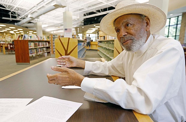 Civil rights figure James Meredith, 85, talks with a news reporter in late June about his plans to visit all 82 Mississippi counties and preach about the Ten Commandments.