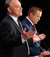 U.S. Sen. Tim Kaine, left, gestures during the debate last Saturday with his Republican opponent, Corey Stewart. The event, held at The Homestead resort in Hot Springs, was sponsored by the Virginia Bar Association. 