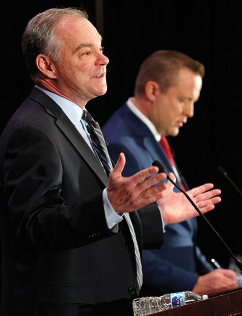 U.S. Sen. Tim Kaine, left, gestures during the debate last Saturday with his Republican opponent, Corey Stewart. The event, held at The Homestead resort in Hot Springs, was sponsored by the Virginia Bar Association. 