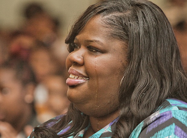 Kiwana Yates, the ousted principal of Carver Elementary School, sheds a tear during a March 2015 school assembly for winning a R.E.B. Award for Distinguished Educational Leadership. The award, given in partnership with The Community Foundation, came with a $15,000 prize. Half was for her personal use. The other half, she said at the time, would be used for educational field trips.