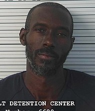 Five people have been charged with child abuse after 11 emaciated children found in trailer.