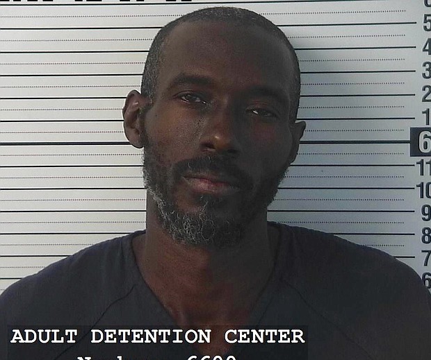 Five people have been charged with child abuse after 11 emaciated children found in trailer.