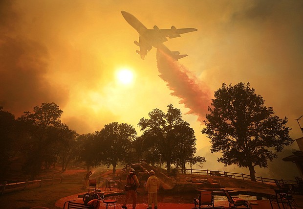 Catastrophic wildfires continue to ravage California, as one blaze nearly doubled in size over the weekend to make it the fourth largest in the state's history.