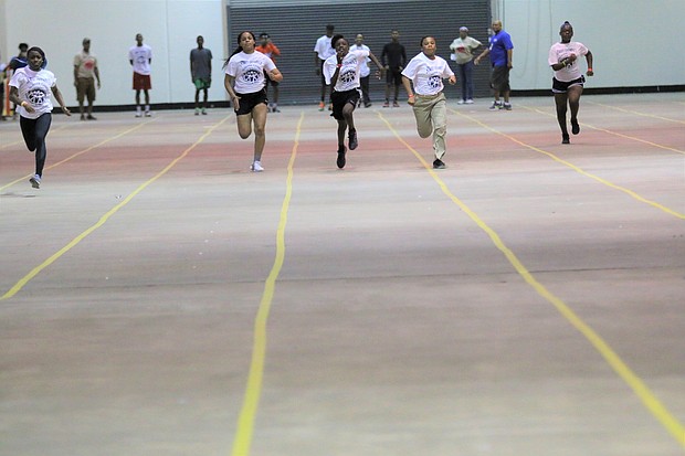  Girls compete in the 100-yard dash at the Harris County Street Olympics Final Event on Aug. 3.
