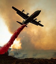 There are 17 large wildfires burning across the state and more than 14,000 firefighters working to put out the blazes, Cal Fire said on Tuesday.
