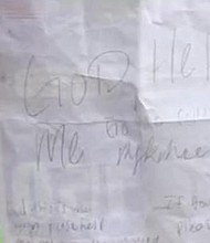 Baptist minister Jerome Jones holds the note Mykehia Curry tied to some balloons. Jones found the note in another town and decided to get her what she needed for college.