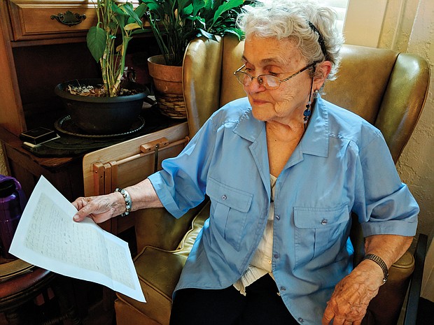 Jeannie Graetz holds a copy of the letter by her former neighbor, Rosa Parks, about the 1957 bombing of the Graetz family’s home in Montgomery, Ala. 