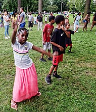 Hundreds of people across metro Richmond turned out Tuesday night for the 35th Annual National Night Out, an event observed across the country to promote safe neighborhoods while building police-community relations. McGruff the Crime Dog and the Richmond Police Department’s top brass and officers made the rounds at several of dozens of events put on by neighborhood and community groups across the city, including the one pictured here at Pollard Park in North Side. Camya Brown, 7, shows off her dance moves during the event.