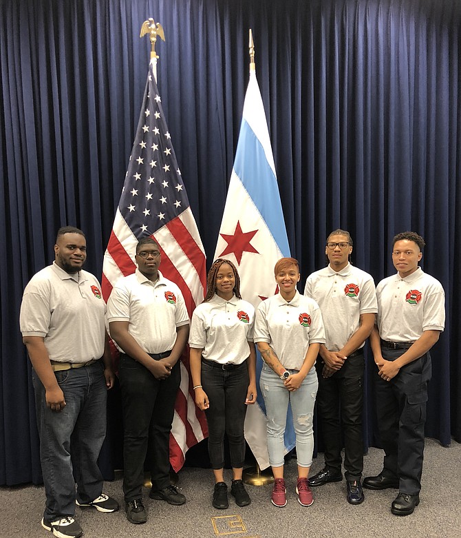 Student of the Black Fire Bridage are pictured in uniform during a visit to City Hall