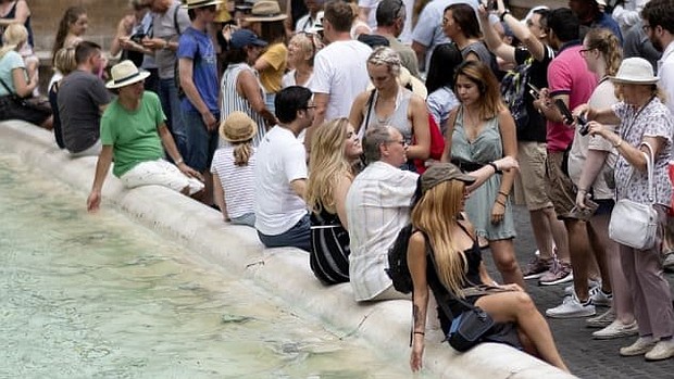 Balancing tourism and overcrowding is a difficult act at The Trevi Fountain, one of Rome's most famous attractions.