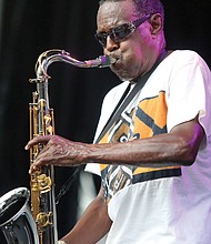 The 9th Annual Richmond Jazz Festival at Maymont last weekend. Hometown favorite Plunky Branch of Plunky and Oneness energizes the crowd Sunday despite the dark storm clouds rolling in.
