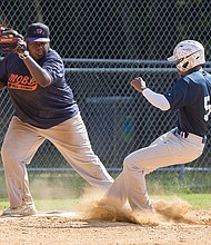 Mitch Jackson, right, narrowly misses being tagged out by Deyshaun Miles as he comes into third base during the Metropolitan Junior Baseball League All-Star Game last Saturday. 