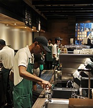 Starbucks will start paying employees to volunteer 20 hours a week.