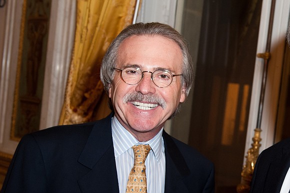 David Pecker, the head of the company that publishes the National Enquirer, was granted immunity in the federal investigation into …