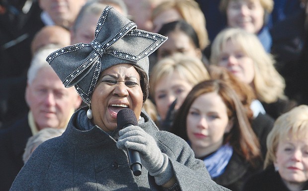 Ms. Franklin, wearing a signature hat, performs “My Country ’Tis of Thee” at President Obama’s first inauguration in January 2009 at the U.S. Capitol in Washington.