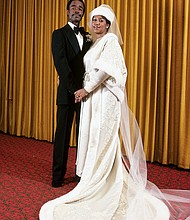 Aretha Franklin is photographed with her new husband, Glynn Turman, at their wedding in April of 1978. 