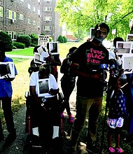 Residents of the Indian Trail Apartments, located on 221 E. 121st St. in West Pullman, recently held a press conference in front of the building to speak about their concerns and alleged declining living conditions in the building. Photo Credit: Katherine Newman