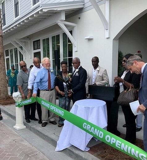 Beaufort County Black Chamber of Commerce President
Larry Holman cuts the Grand Opening Ribbon.
