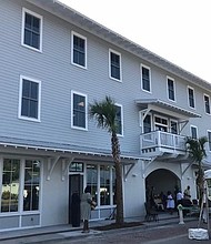 Beaufort County Black Chamber of Commerce President
Larry Holman cuts the Grand Opening Ribbon.
