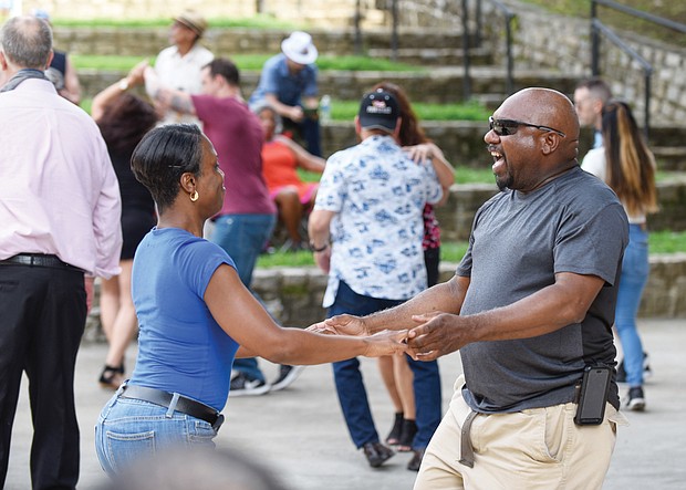 Flavor of dance
The stage at Dogwood Dell amphitheater in Byrd Park turned into a dance floor last Saturday for couples to show off their best moves at the 11th Annual Latin Jazz and Salsa Festival. Hosted by the nonprofit Latin Jazz and Salsa Show/Festival Inc., the event featured a bevy of performers who made spectators want to get up and dance. Sukenya Best and Willie “Mac” McDonald get into the flavor of the dance.