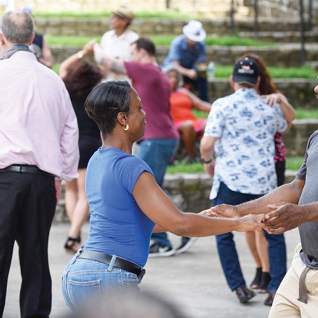 Flavor of dance
The stage at Dogwood Dell amphitheater in Byrd Park turned into a dance floor last Saturday for couples to show off their best moves at the 11th Annual Latin Jazz and Salsa Festival. Hosted by the nonprofit Latin Jazz and Salsa Show/Festival Inc., the event featured a bevy of performers who made spectators want to get up and dance. Sukenya Best and Willie “Mac” McDonald get into the flavor of the dance.