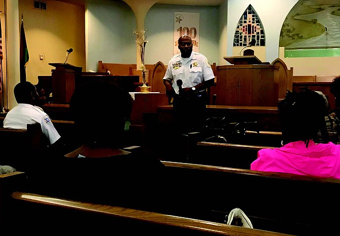 A recent public safety meeting, hosted by 4th Ward Alderman, Sophia King, and 3rd Ward Alderman, Pat Dowell, featured detailed information on the tactical strategy to decrease crime in the Chicago Police Department’s 2nd District which is now led by Commander Dion Boyd (pictured) who spoke about his strategy to reduce crime. Photo Credit: Katherine Newman