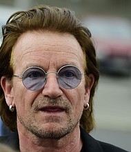 Legendary Irish rock band U2 cut short a performance in Berlin on Saturday night, later saying that lead singer Bono had "suffered a complete loss of voice."