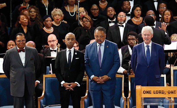Together in the pulpit at Greater Grace Temple during the service are, from left, Minister Louis Farrakhan of the Nation of Islam; the Rev. Al Sharpton of the National Action Network; the Rev. Jesse L. Jackson Sr. of the National PUSH Rainbow Coalition; and former President Bill Clinton.