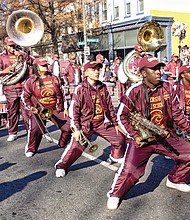 The Petersburg High School Marching Band performs in a holiday parade in 2015.